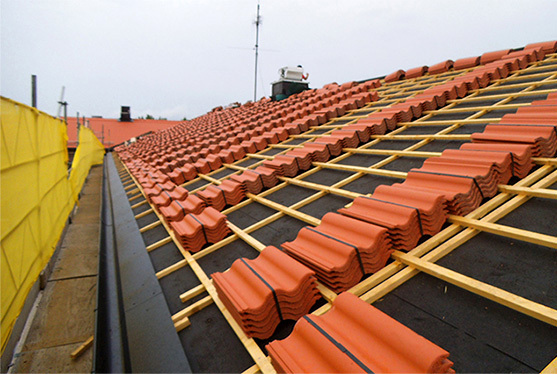 Vi utför tak- och tegelomläggningar i Stockholm